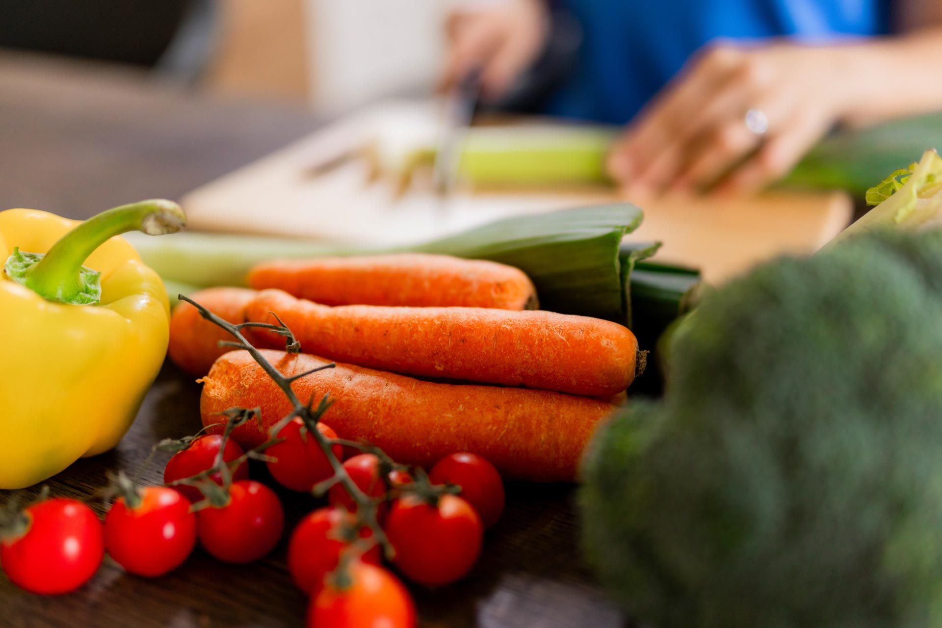 Angeli Degardin hands chopping vegetables