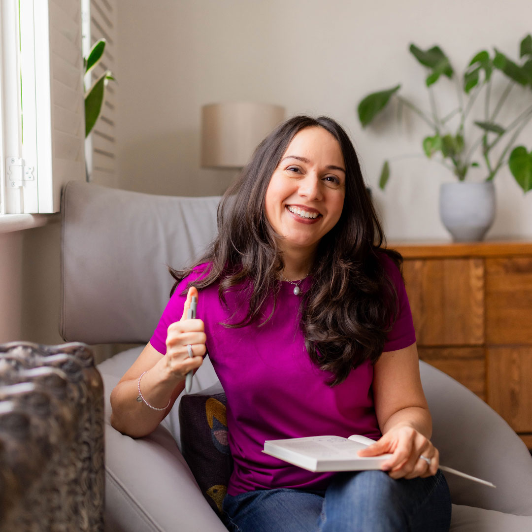 Angeli Degardin Nutrition berry top with a notebook and pen